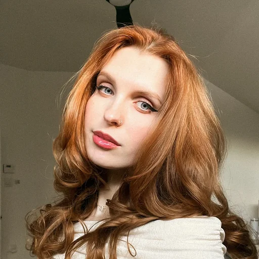 Portrait of a red-haired creator
