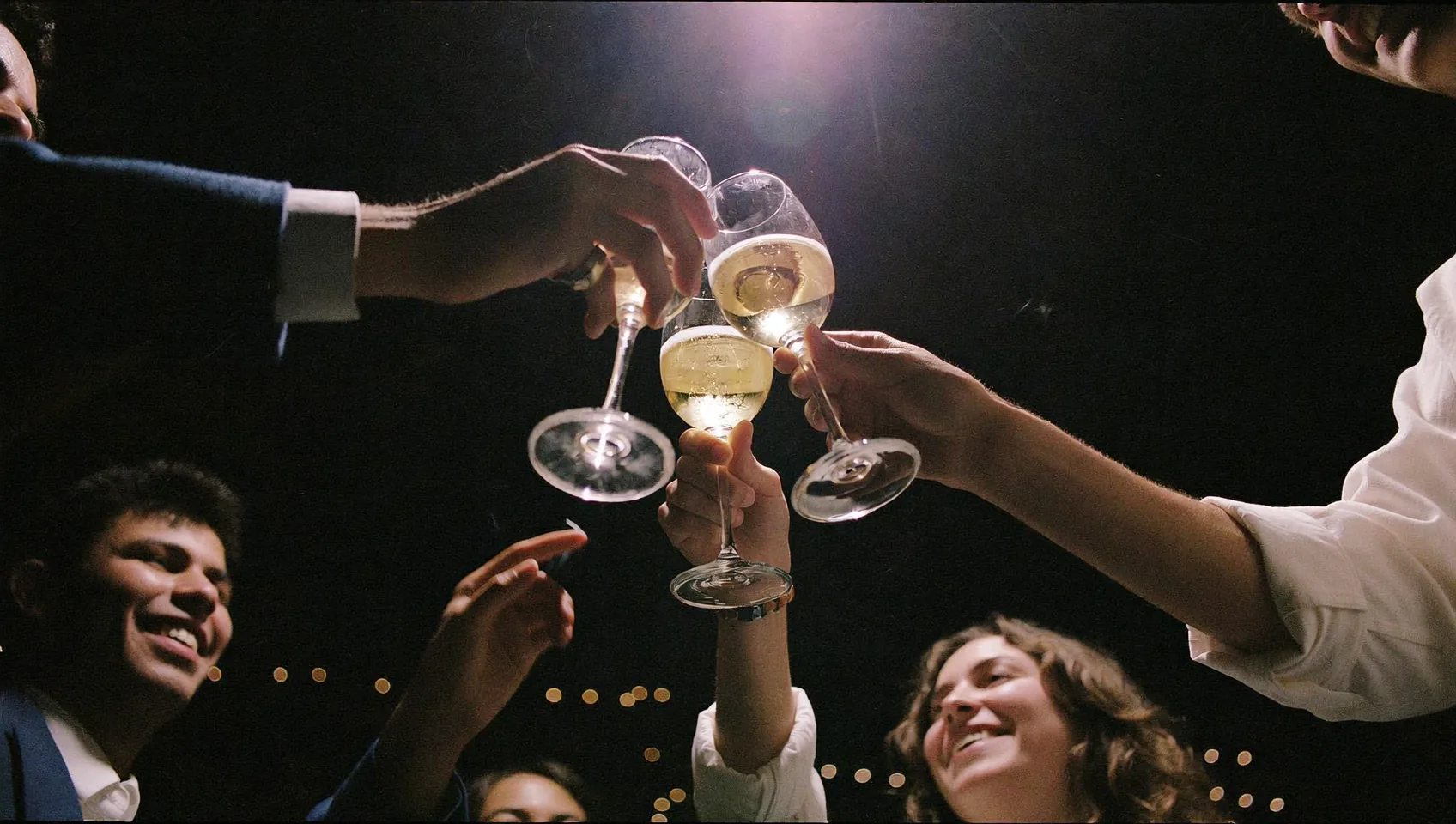 Group toasting with champagne glasses